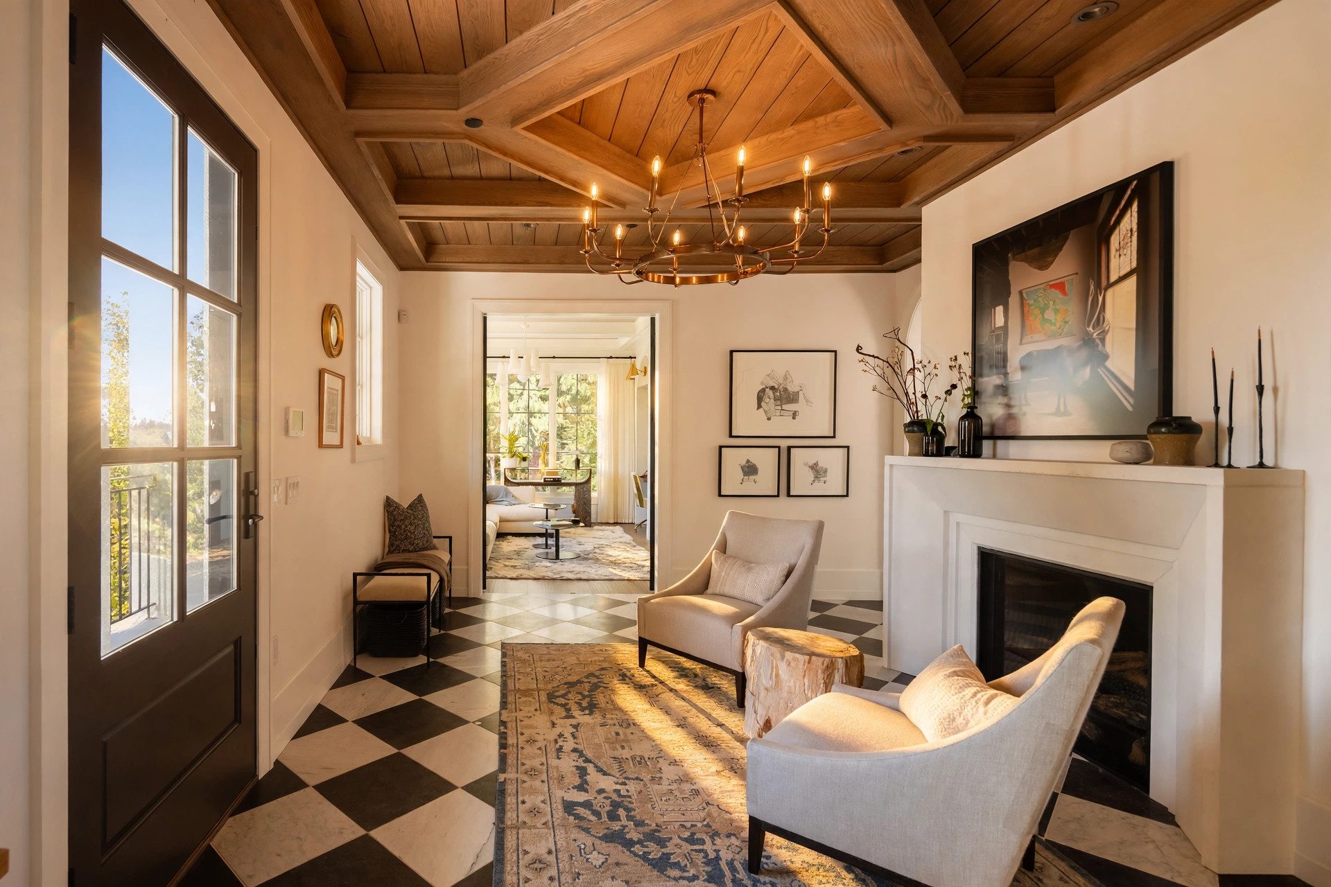 Elegant living room with a stone fireplace and detailed ceiling